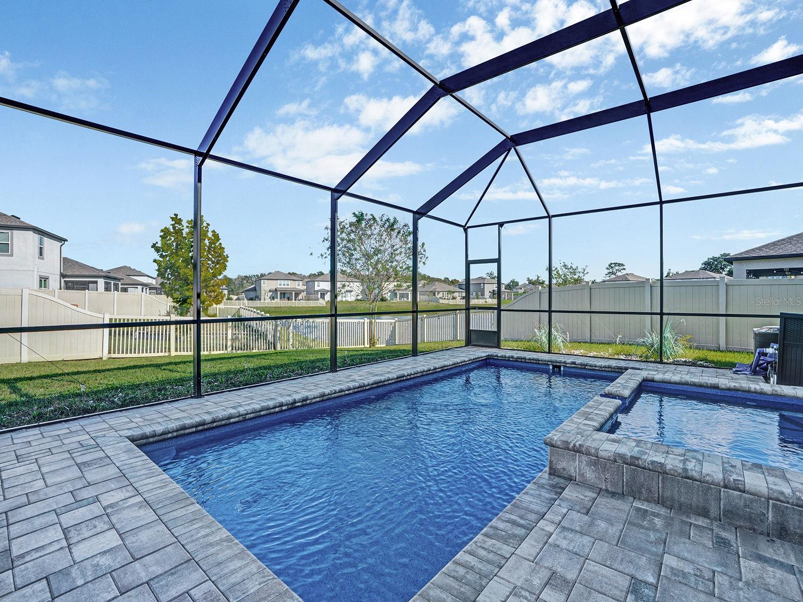 Fiberglass Pool with view of pond