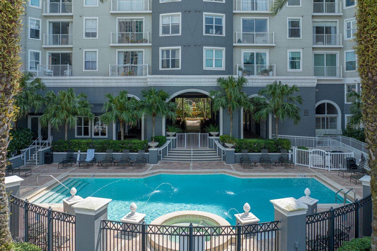 A spacious pool with a relaxing spa sits right along the riverwalk.