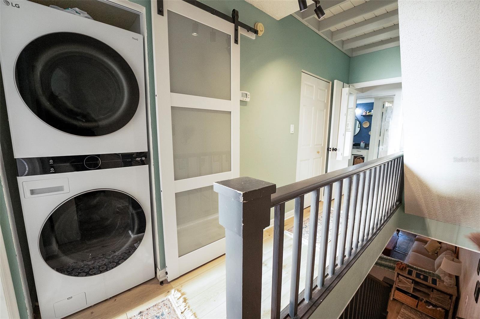 Hall Laundry Closet between bedrooms