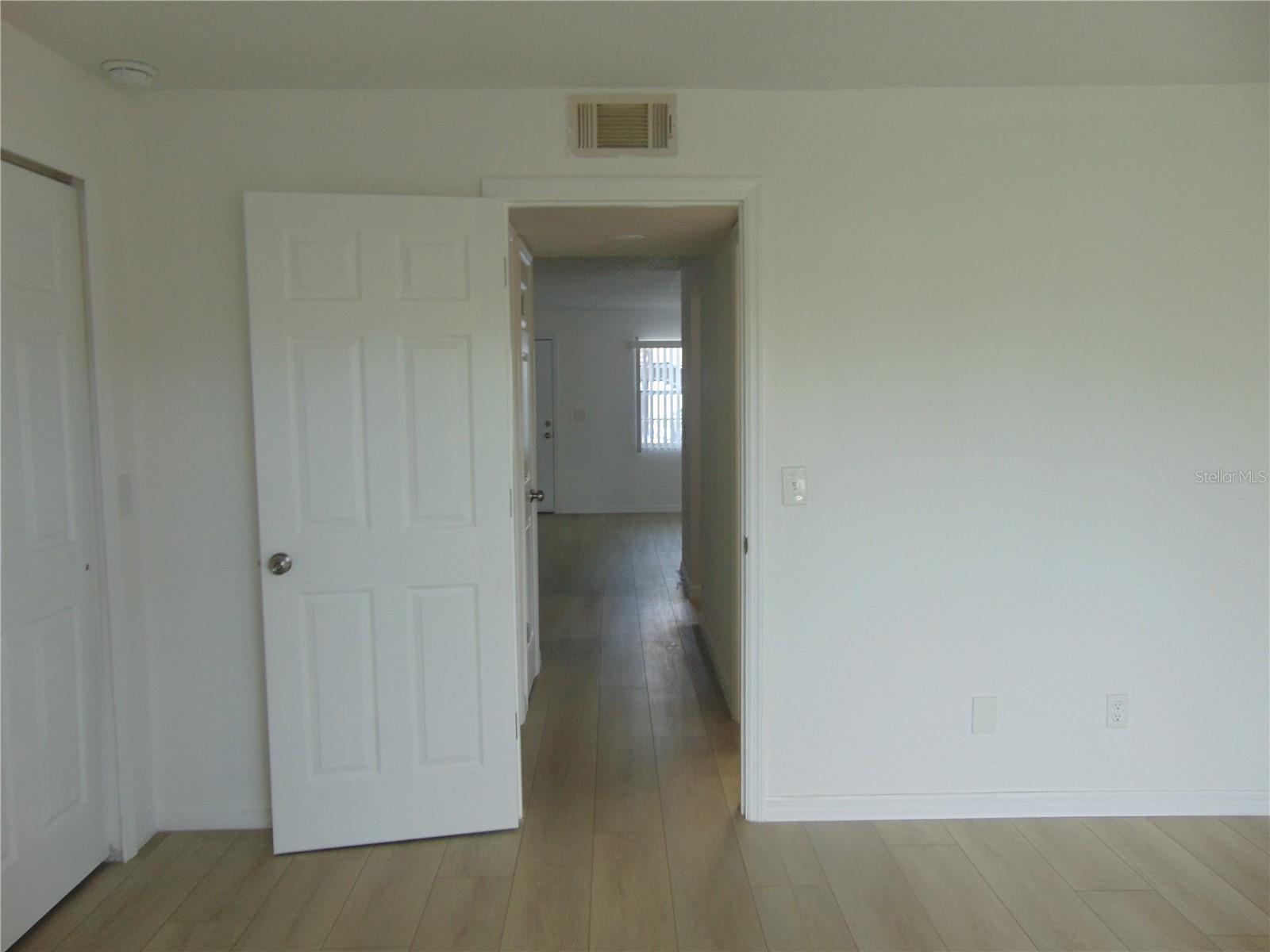 Hallway view from bedroom to living room