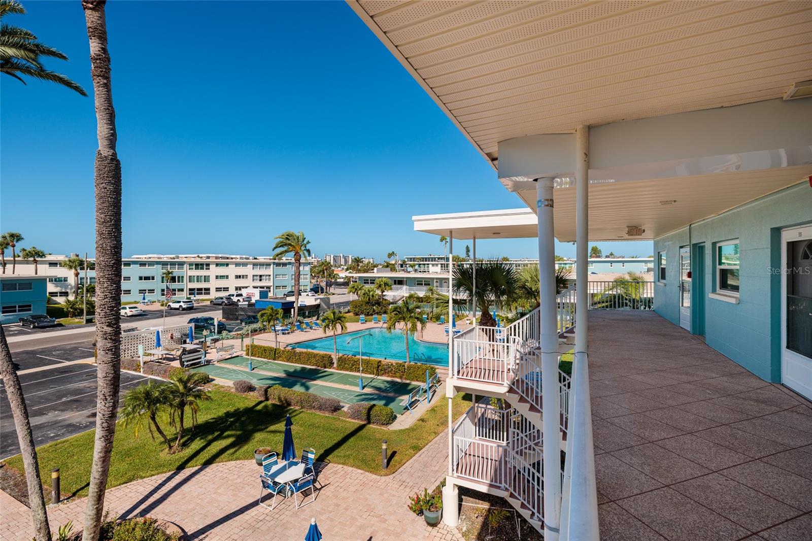 Courtyard & pool. Grilling area & shuffle board court.