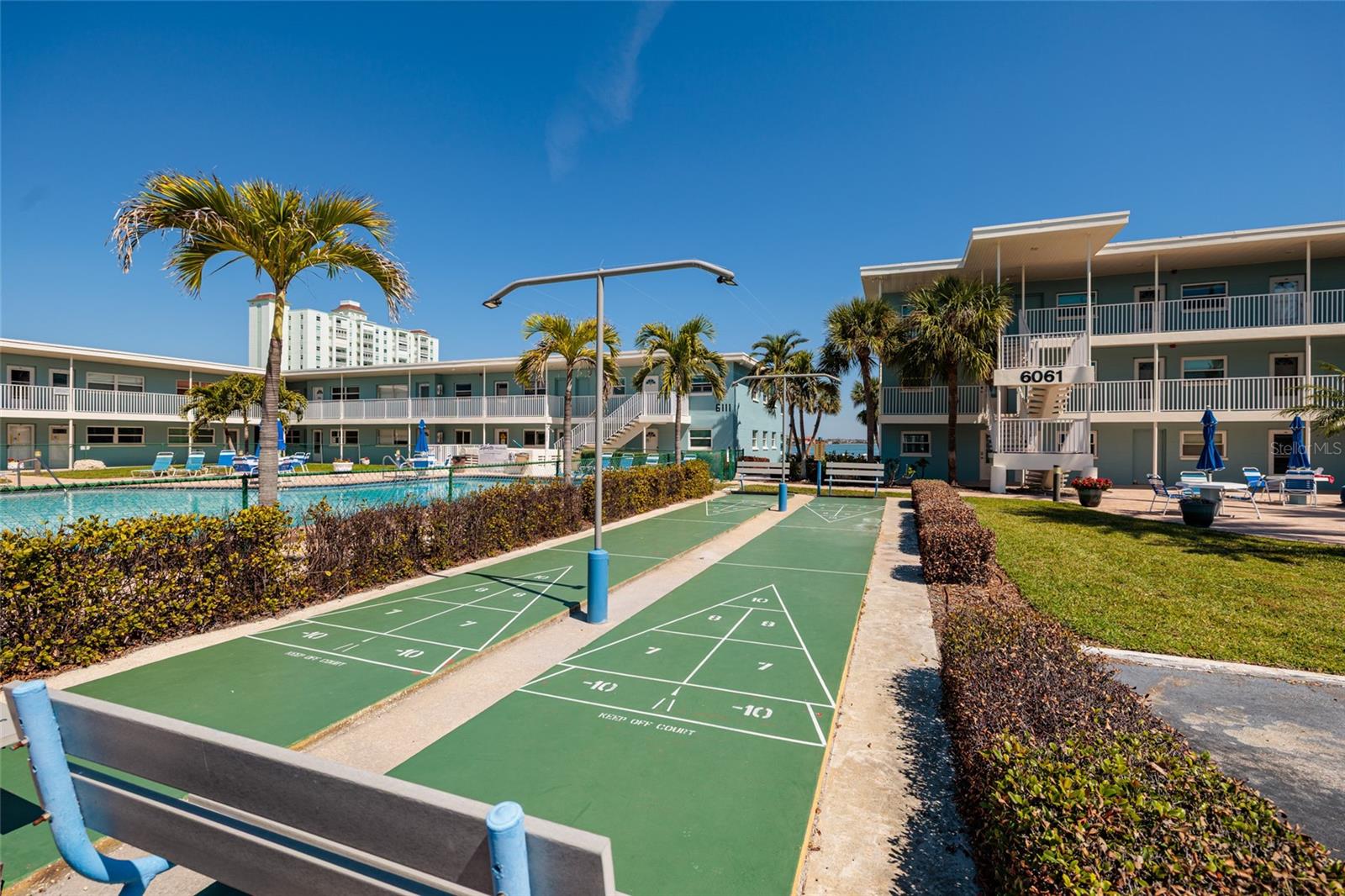 Shuffleboard court next to the grilling area.