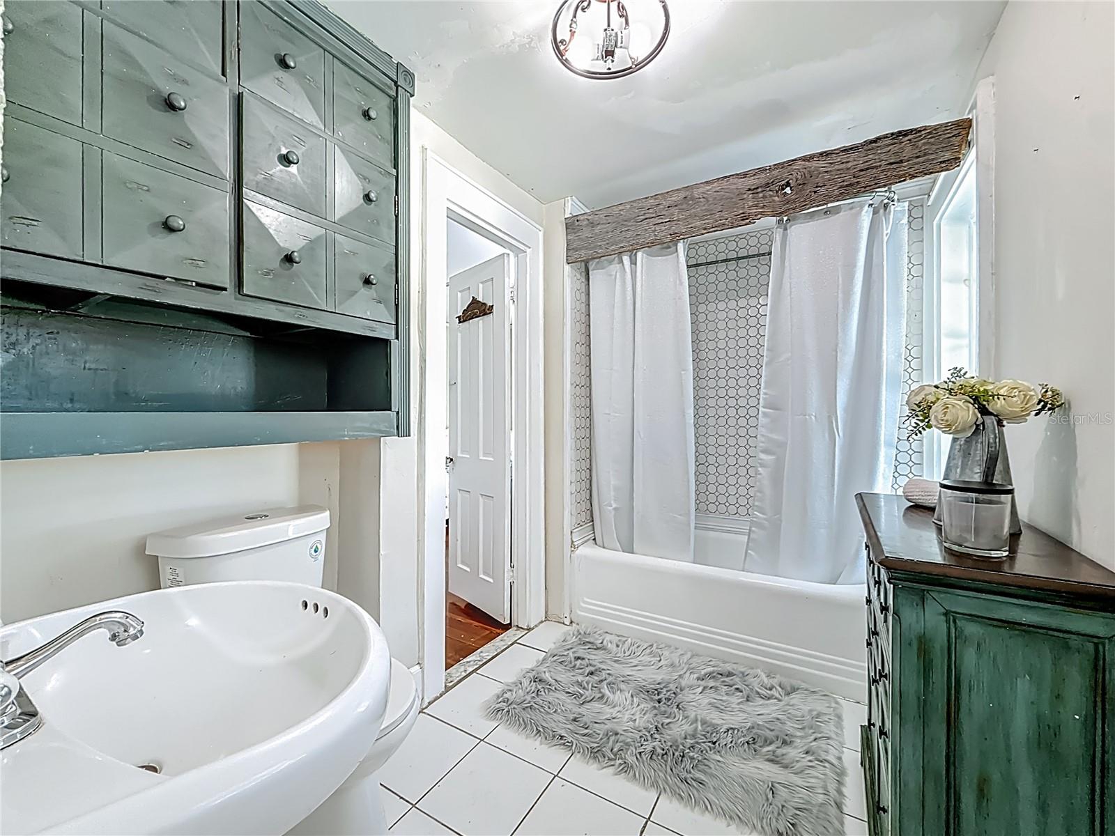 Upstairs Bathroom attached to Primary bedroom and bedroom 2
