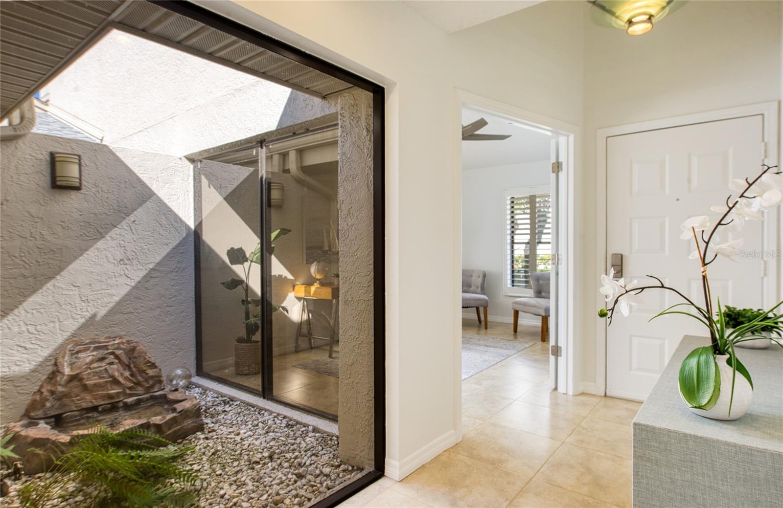 Atrium between the kitchen and den/office