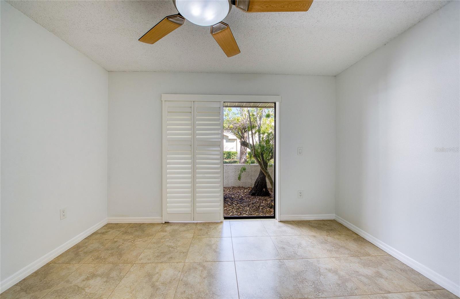 Guest Bedroom with sliders to outside