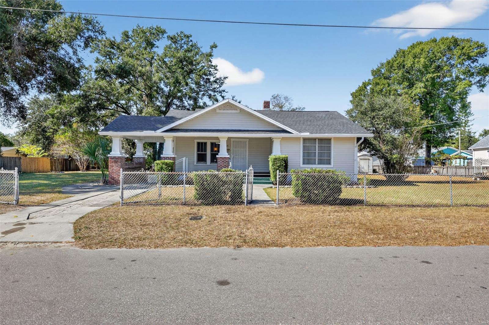 5806 N Cherokee Avenue, a historic 1928 bungalow on 3 lots in Seminole Heights.  Freshly painted exterior and a new roof installed November 2025.