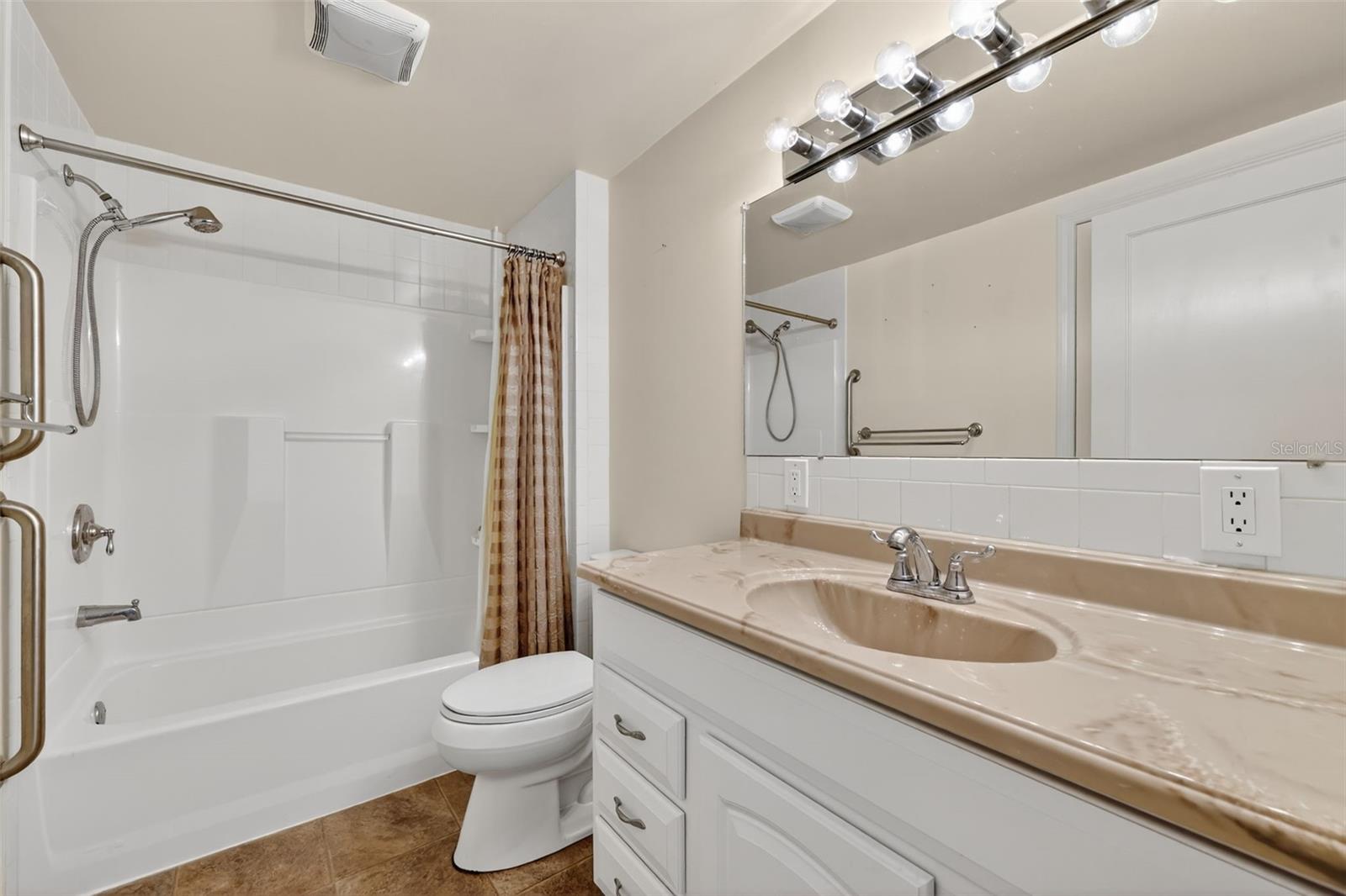 Full bathroom with large linen closet