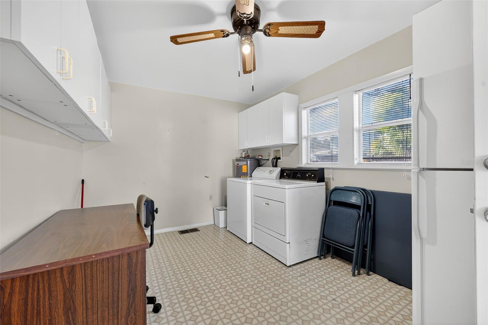 Enjoy a 14' laundry/utility room that could also be a craft area or office workspace.