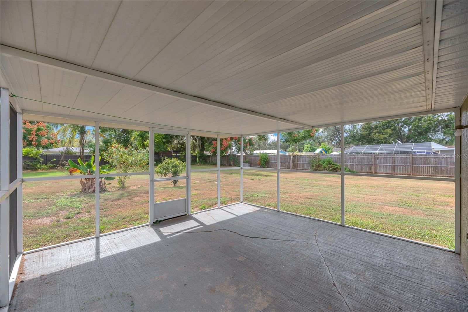15' x 15' covered and screened patio over looking immense backyard.