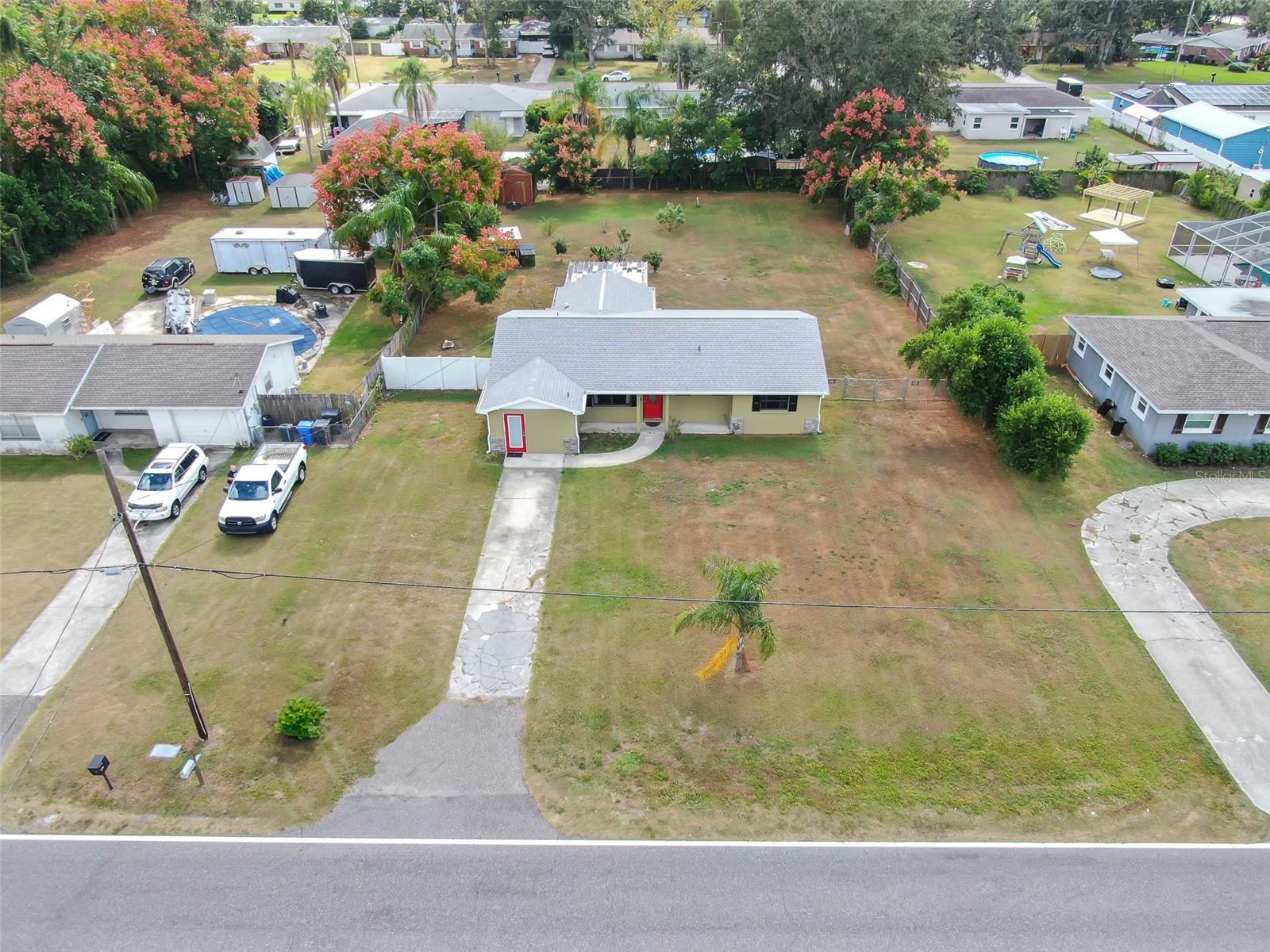 Home with attached business suite on Nearly ½ Acre in Valrico!  No HOA. No CDD.  1,711 sq. ft. of living space plus a fully equipped, ADA-compliant business suite with good exposure along Lumsden Road