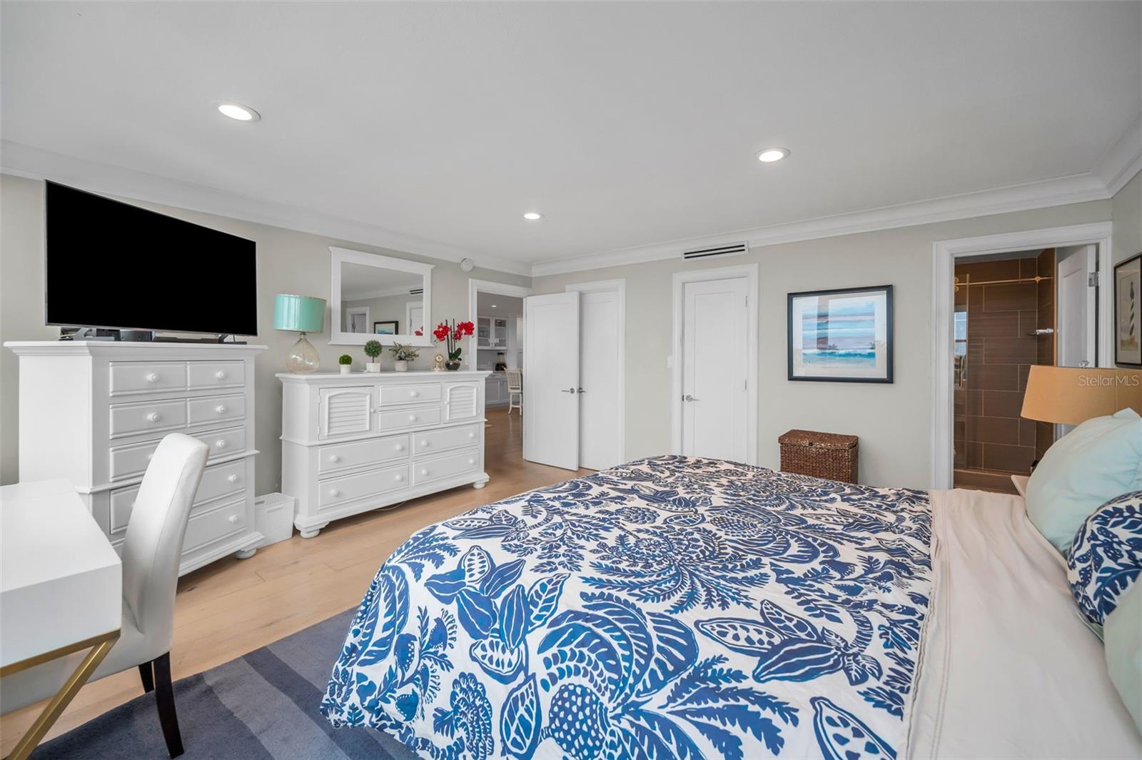 Two closets and an en suite bathroom for this main bedroom