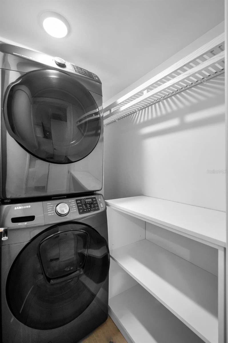 Laundry room with storage space