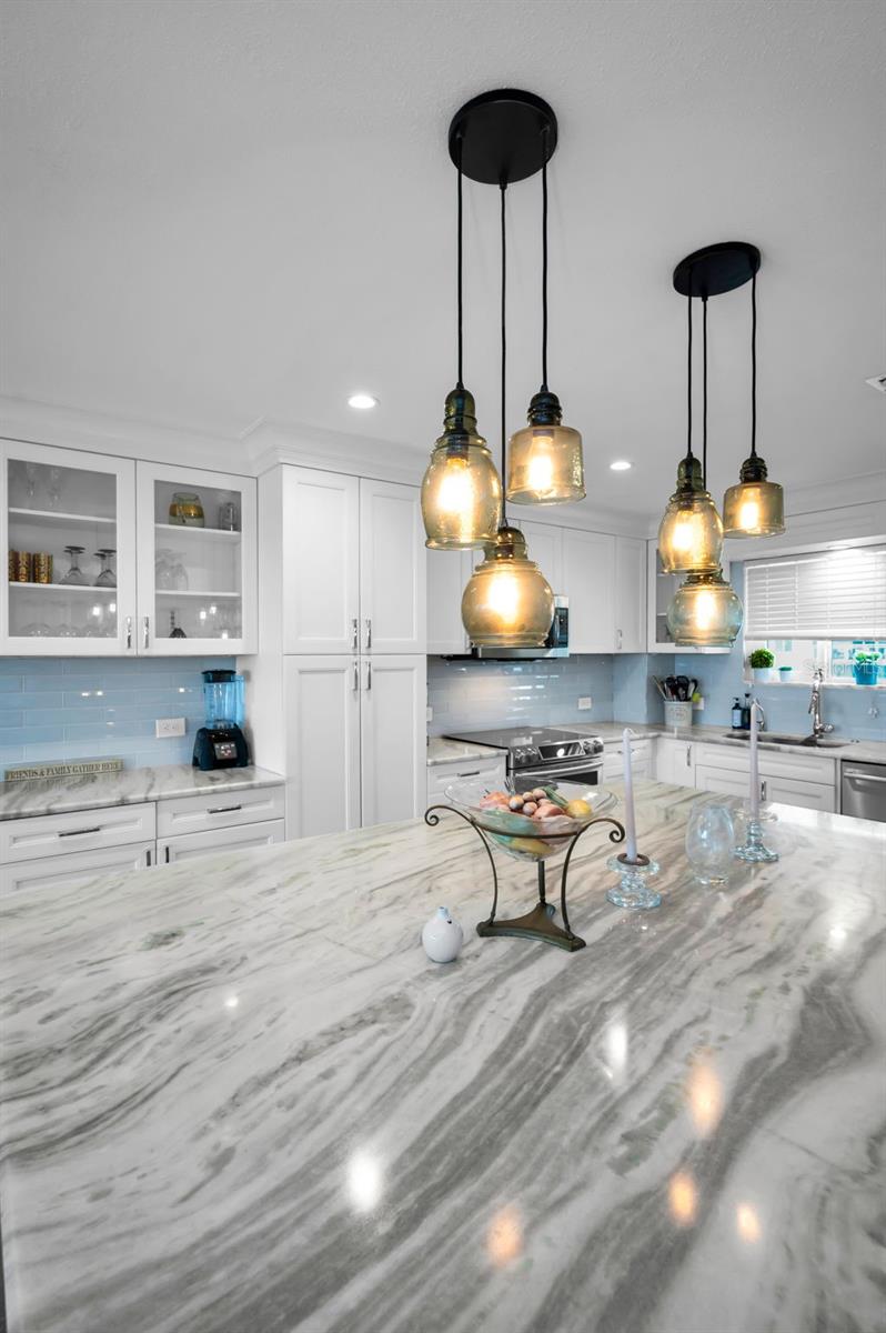 Oversized quartz island with storage underneath