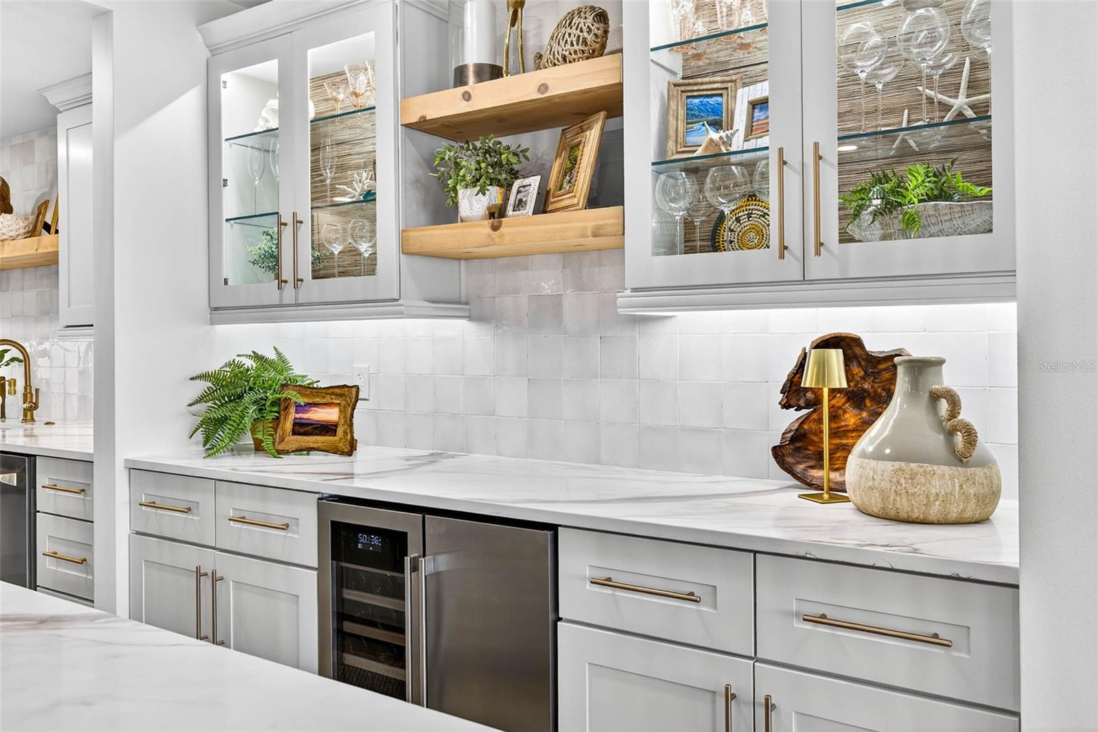 Lighted cabinets and floating shelves