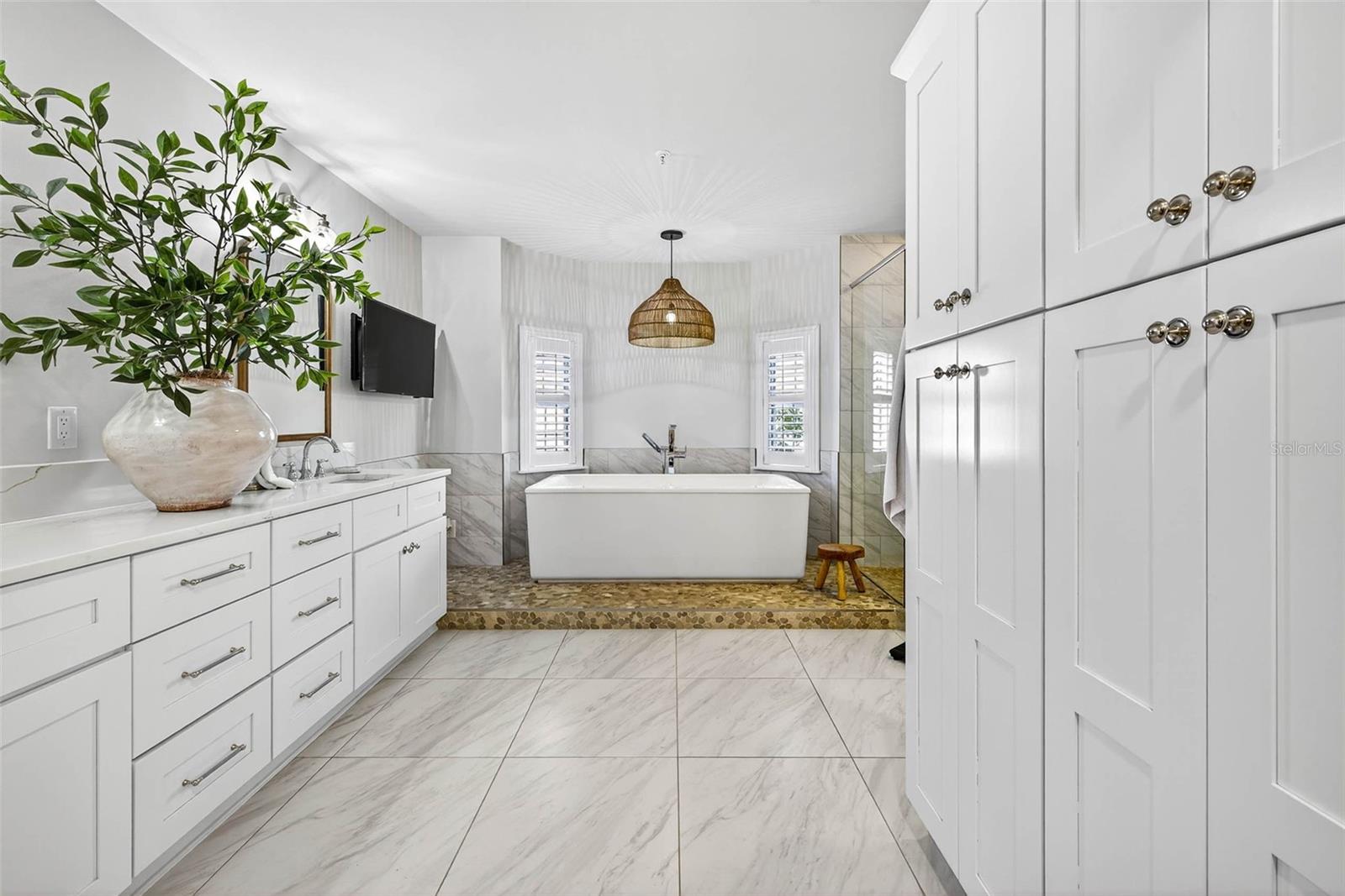 Gorgeous owners suite bathroom....So much storage!