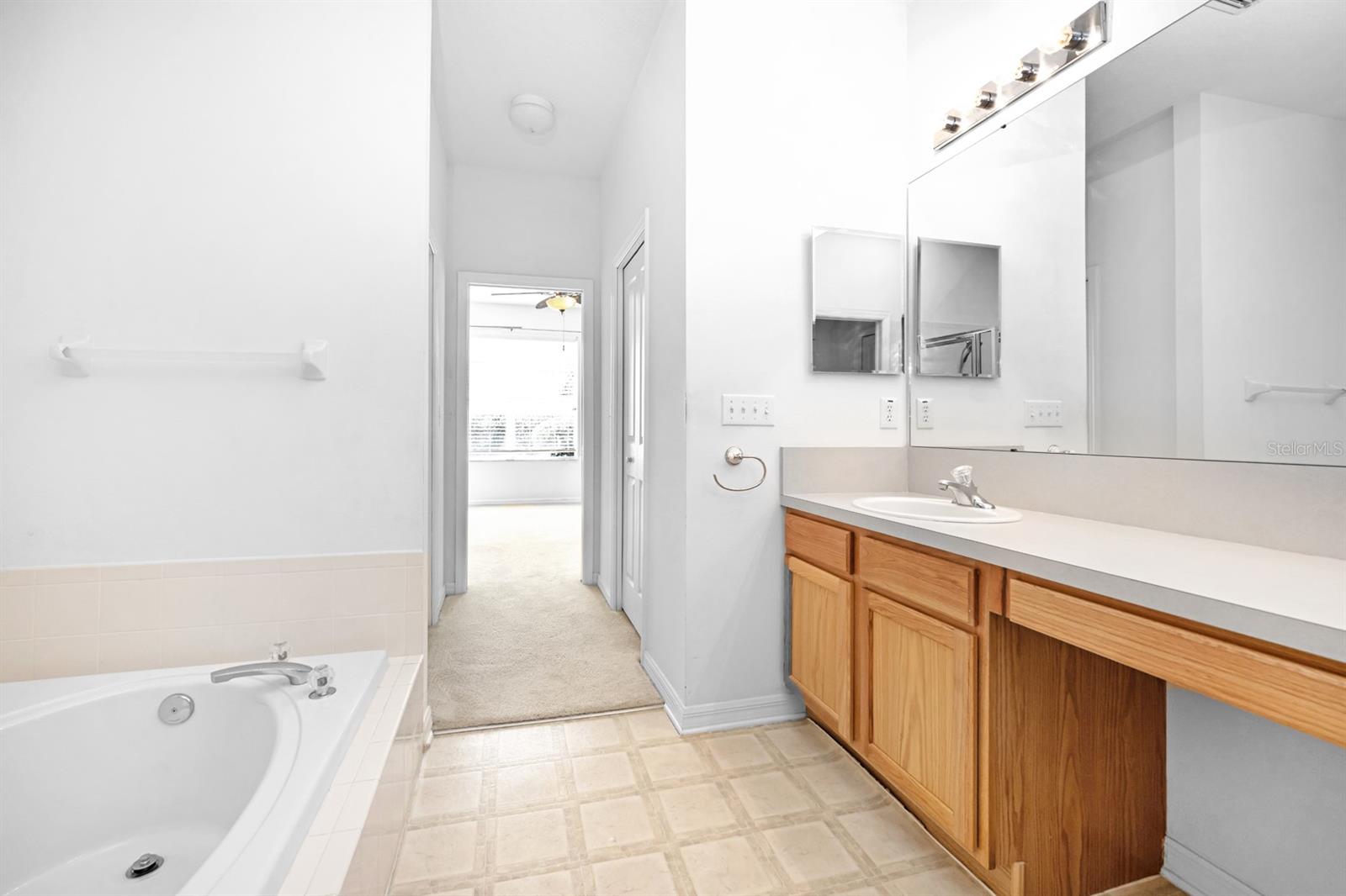 VIEW LOOKING INTO MAIN BEDROOM