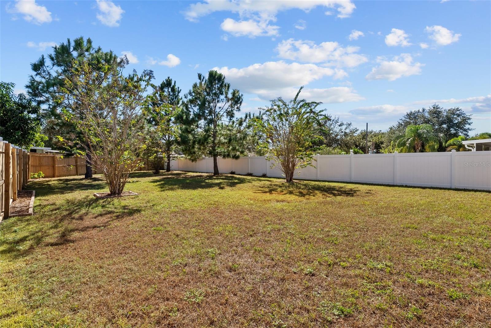 3rd view of large backyard.