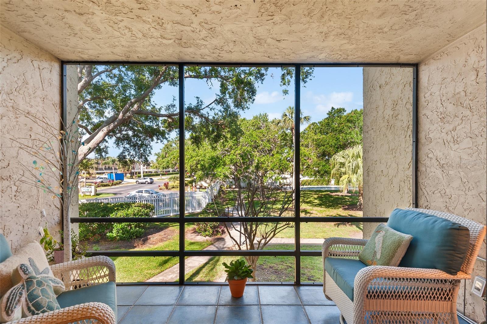 Tiled,screened in Patio.