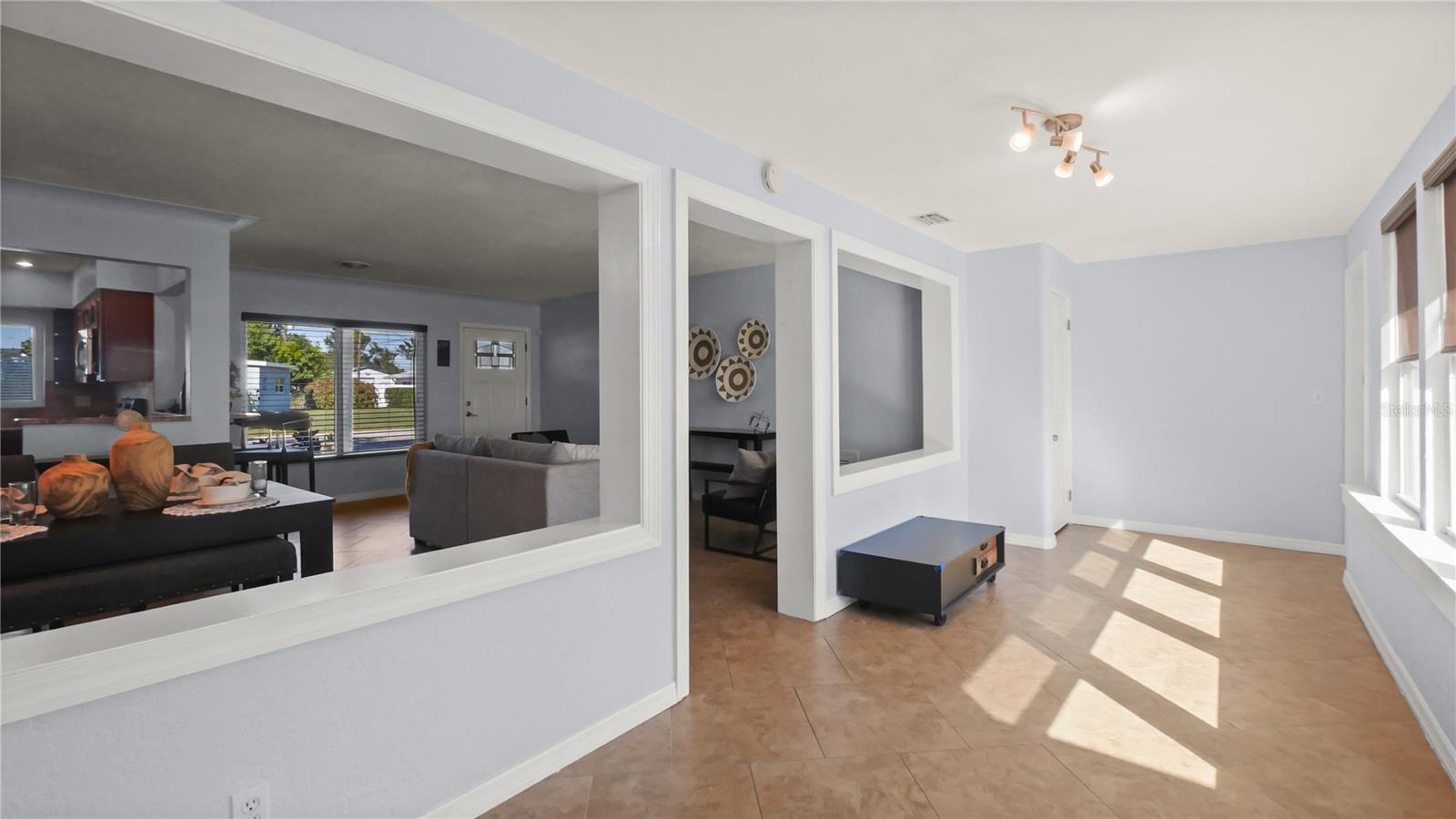 Sun-Filled Sitting Room off of Living Space