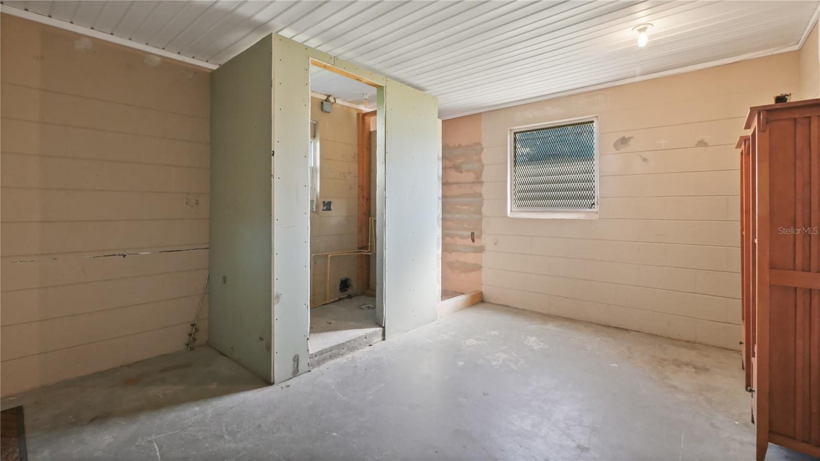 Plumbed flex space ready for guest suite or studio conversion