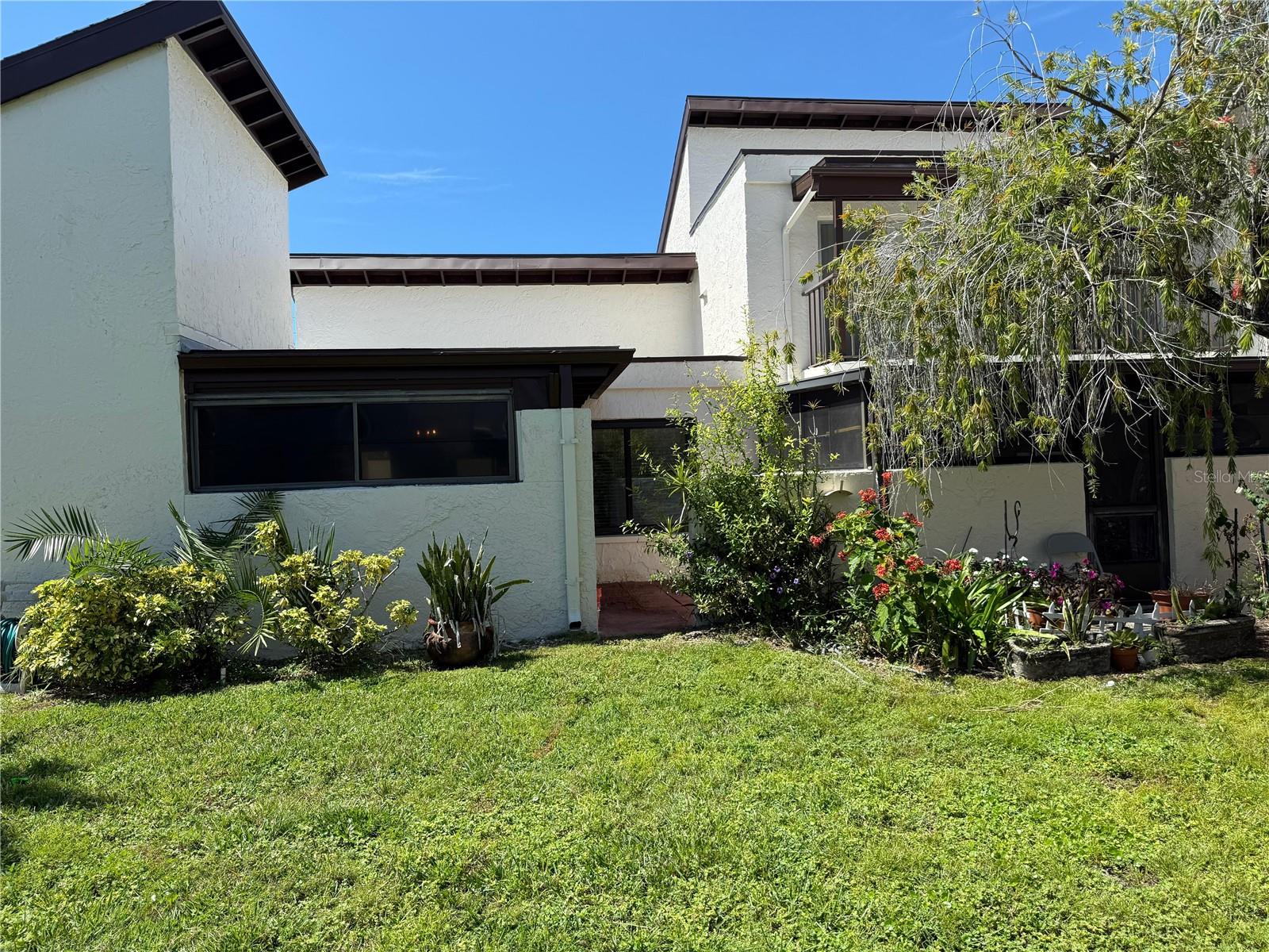 From the greenbelt looking into your patio, nice privacy.