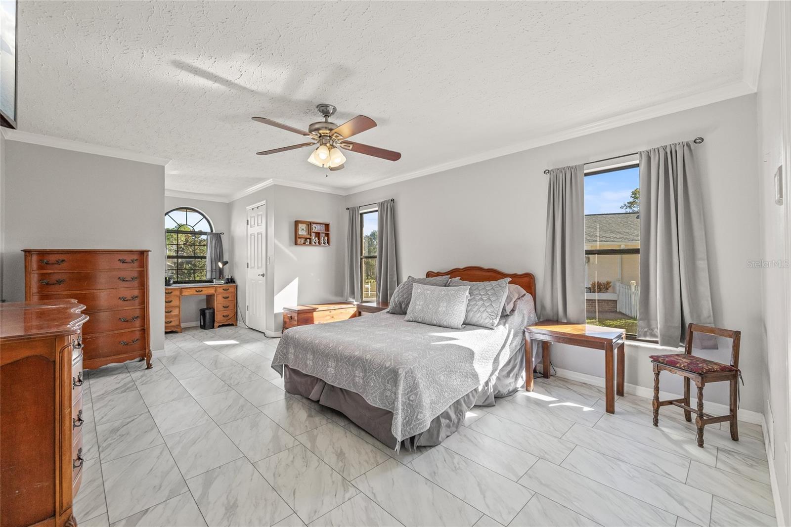 Primary suite with 2 walk in closets