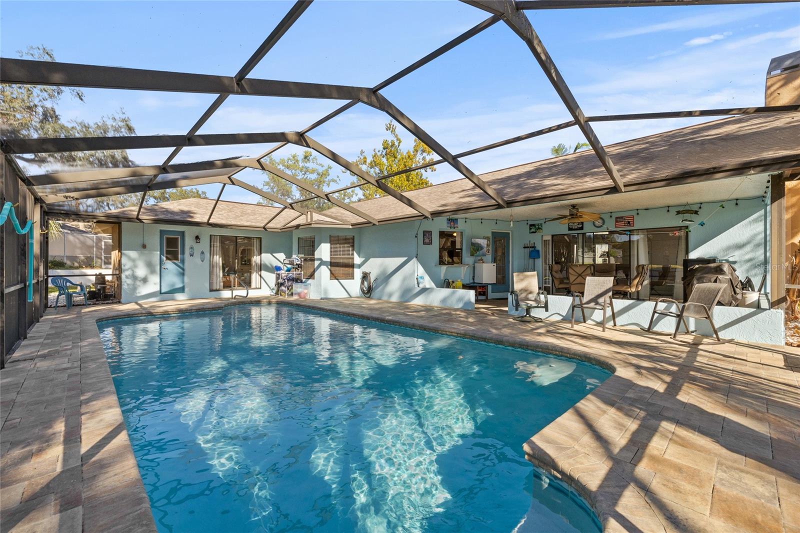 Screened pool with pavers