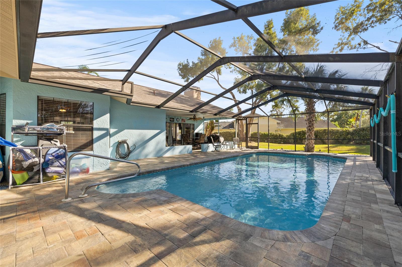 Screened pool with pavers