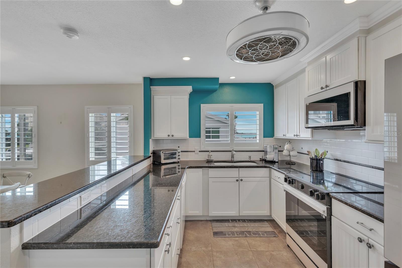 This rare end-unit means light and bright views from every room!