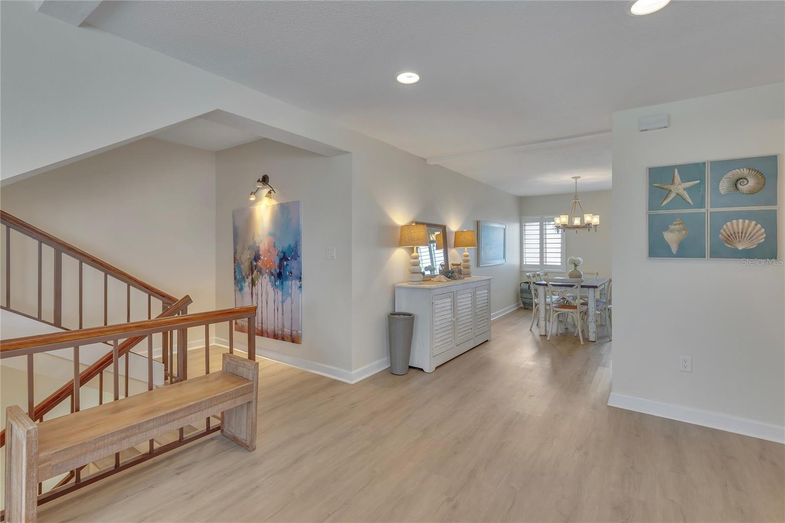 This looking from the living area into the dining and kitchen areas.