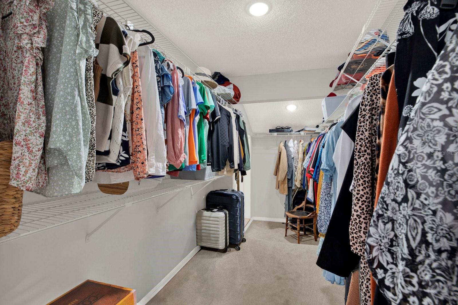 PRIMARY CLOSET WITH SECOND WATER HEATER
