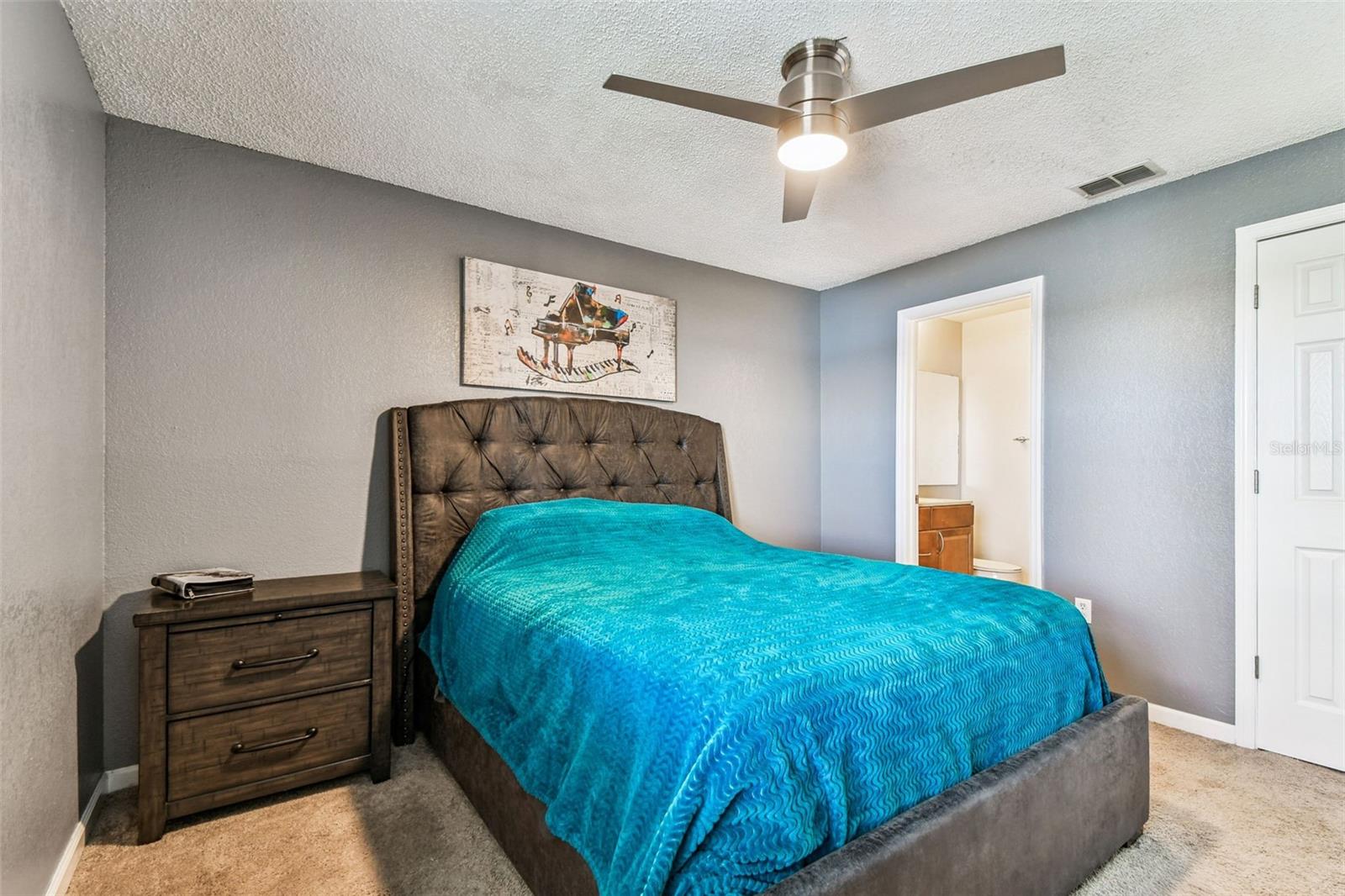 Primary bedroom, on rear of condo.