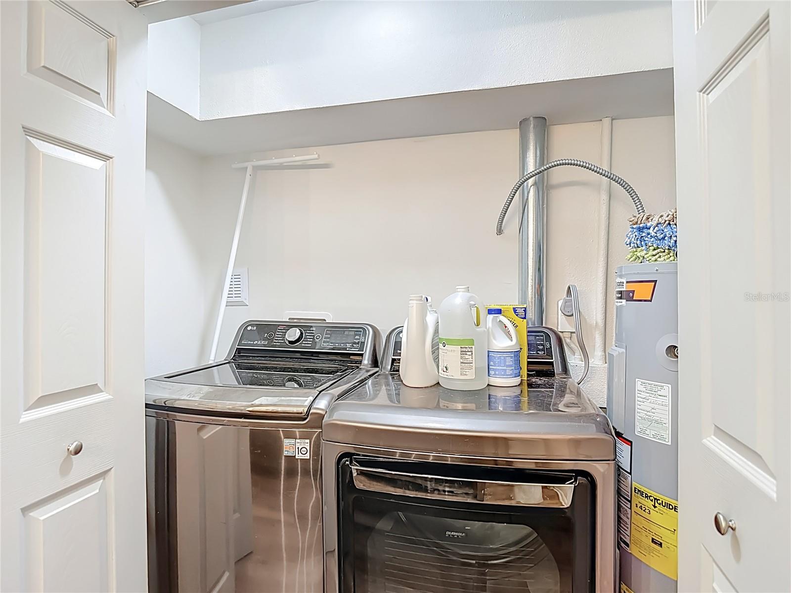 laundry room located in primary bathroom