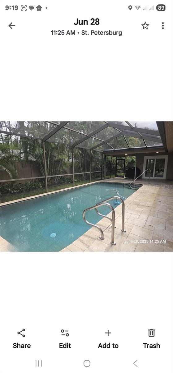 Beautifully Updated Pool with new finish and Travertine Deck.