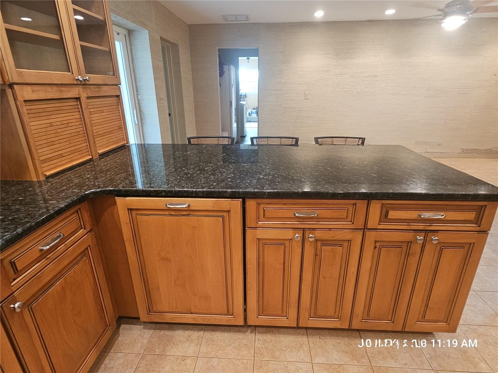 Updated kitchen with dishwasher and subzero refrigerator having matching cabinet faces!