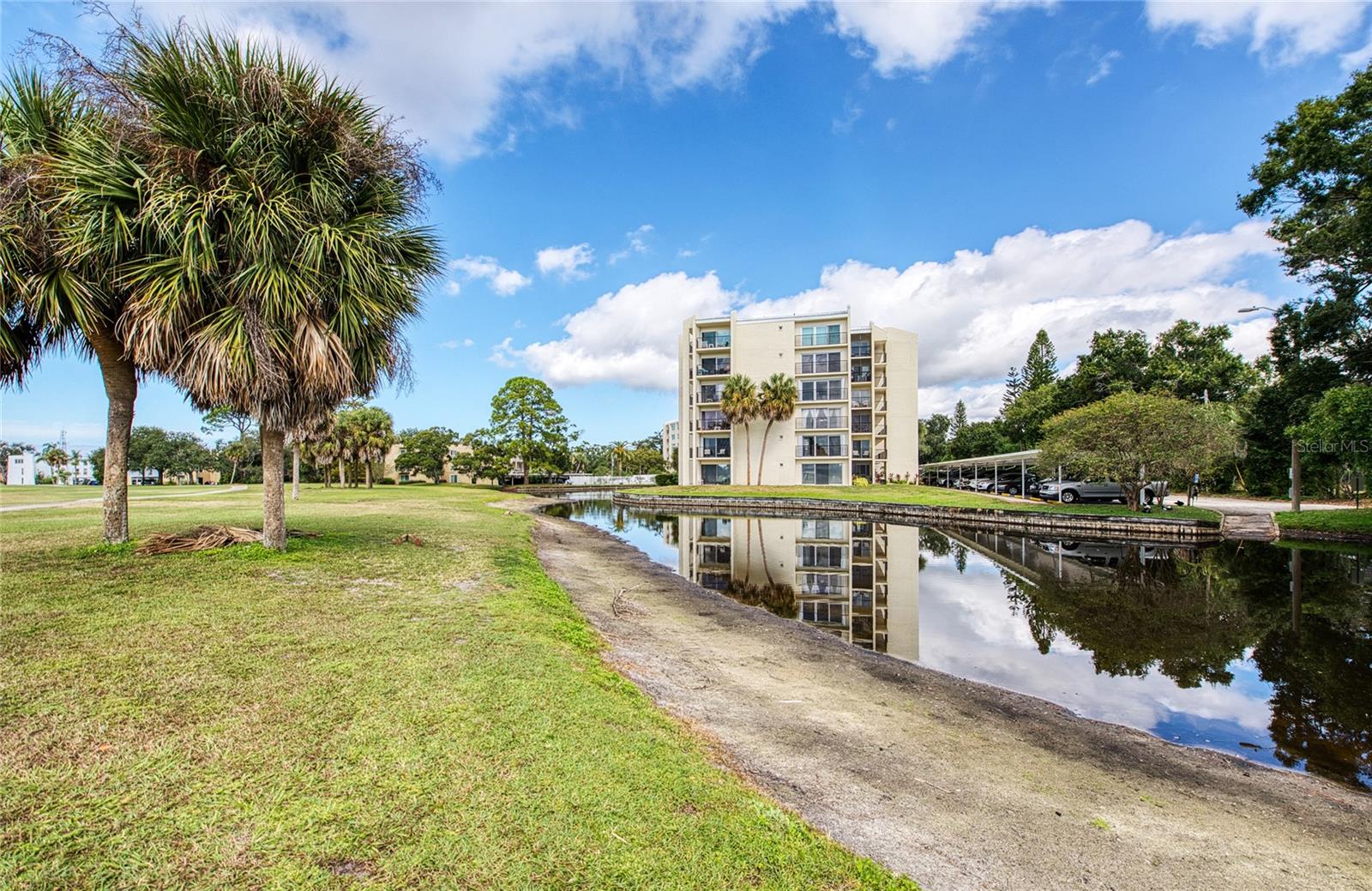 POND WITH VIEW OF THE FAIRWAY BLDG.