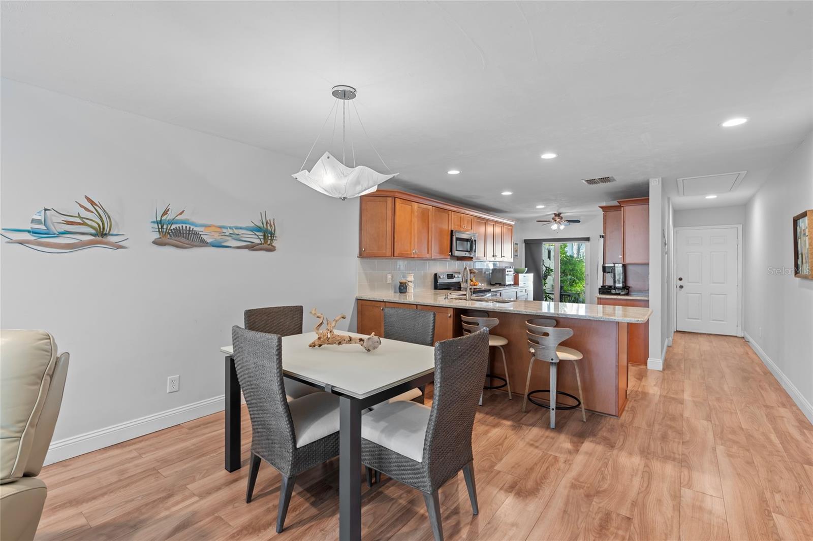 Open floor plan to kitchen, dining and living room