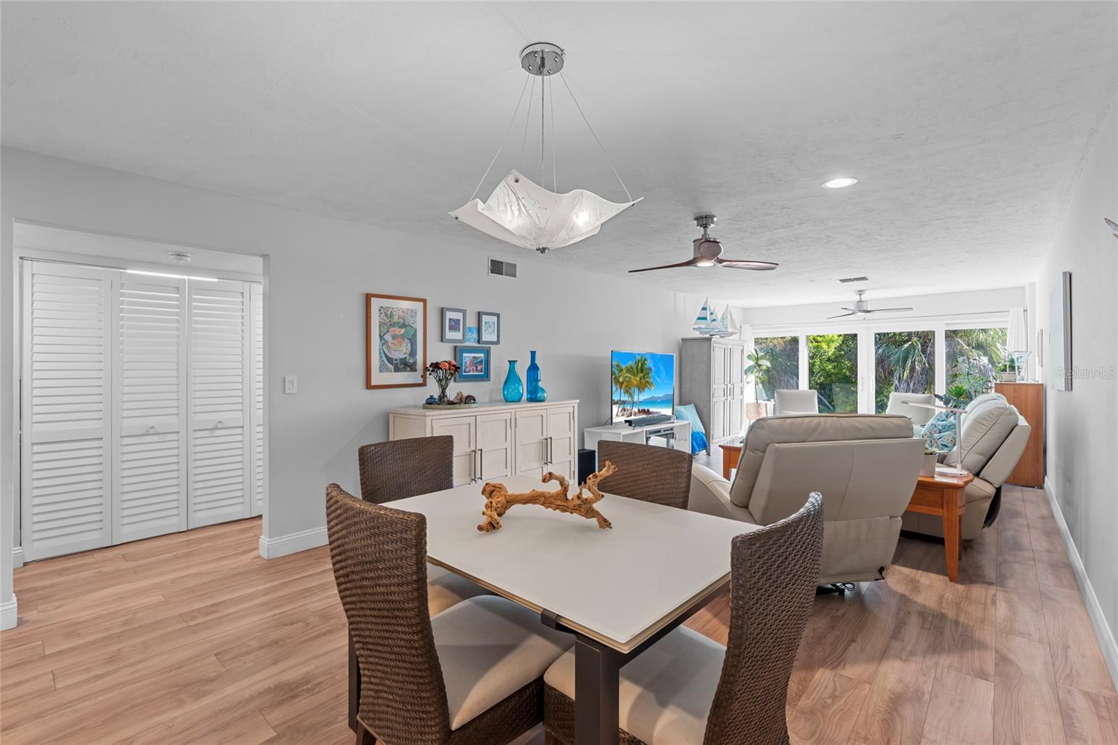 Open floor plan to kitchen, dining and living room