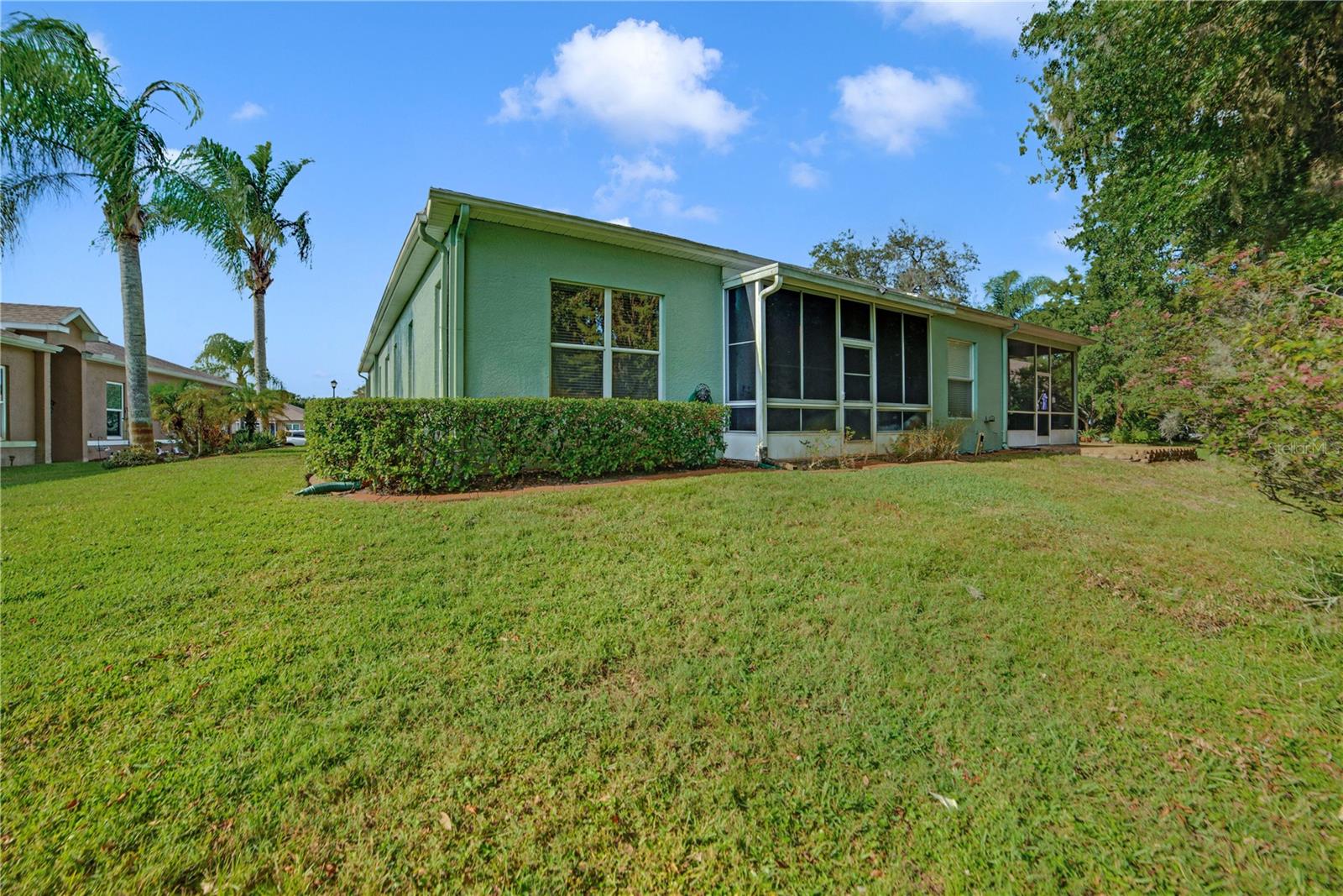 LOVELY REAR VIEW OF VILLA WITH LANAI