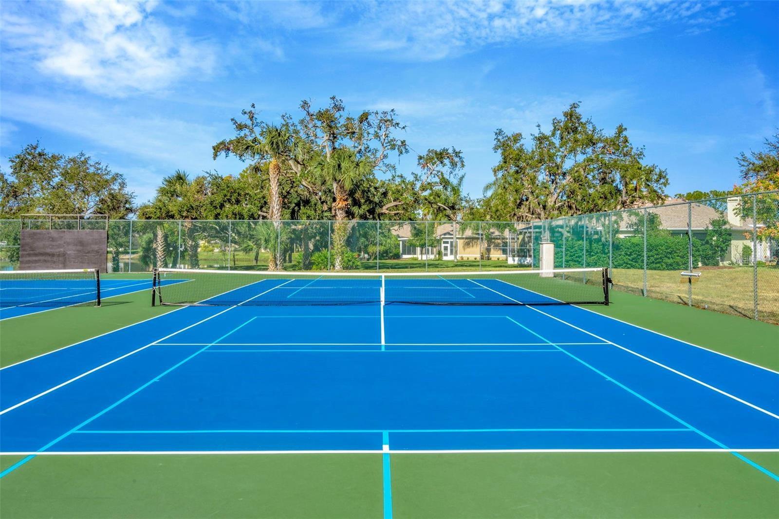 TENNIS ANYONE? BEAUTIFUL COURTS NEAR THE CLUB HOUSE