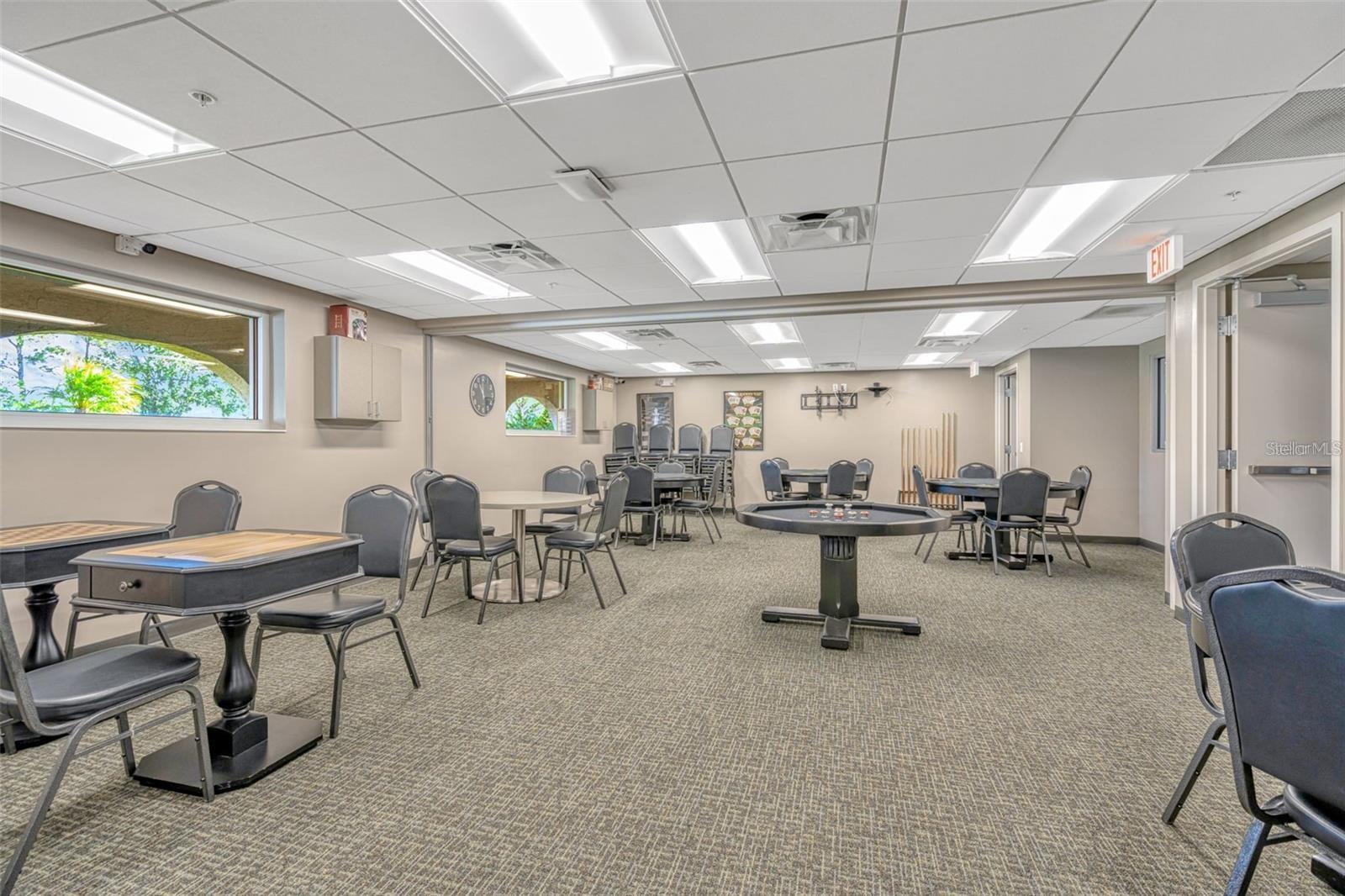 THE USUALLY BUSY CARD ROOM AT THE CLUBHOUSE