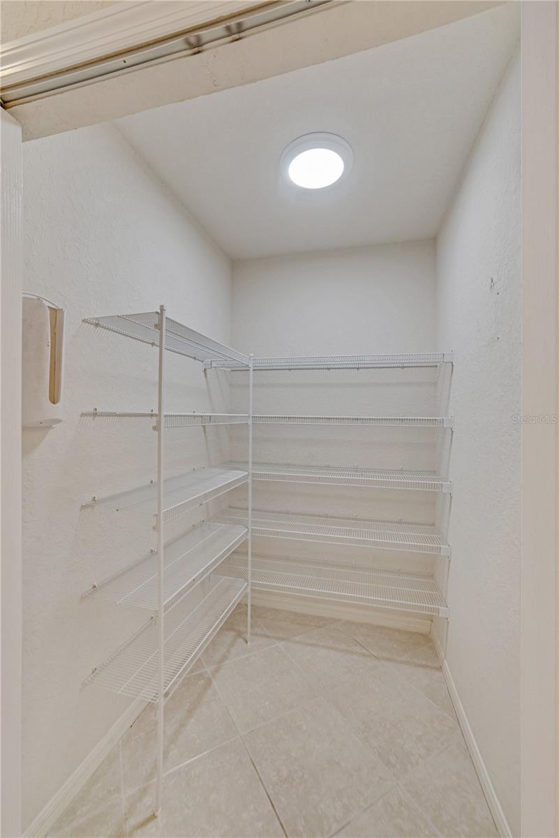 PANTRY CONVENIENTLY LOCATED IN DINING/FLEX AREA