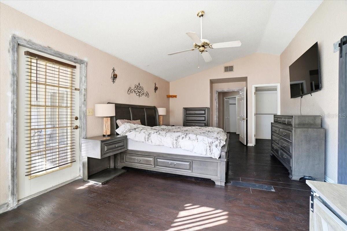 Primary with exit door to pool