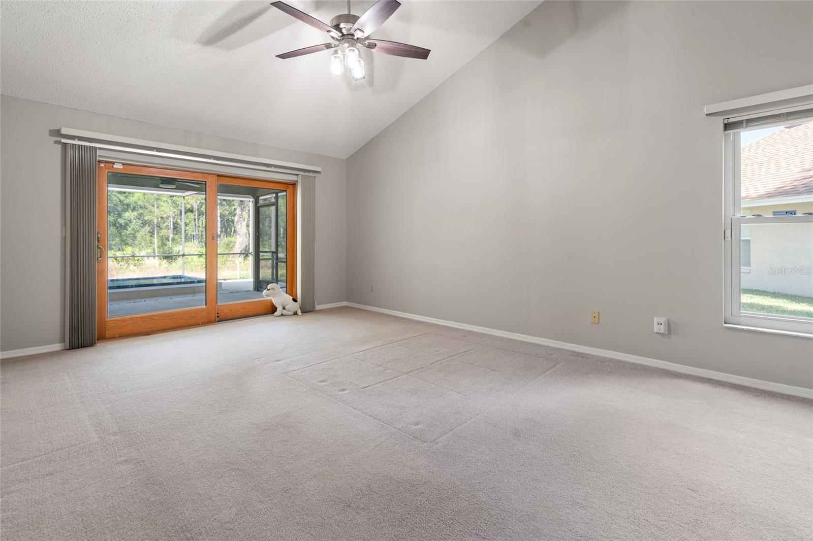 Primary Bedroom w/ impact resistance sliders and awesome view