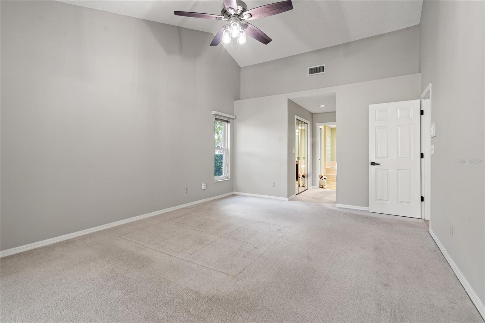 Primary Bedroom w/ double closets and en-suite bath