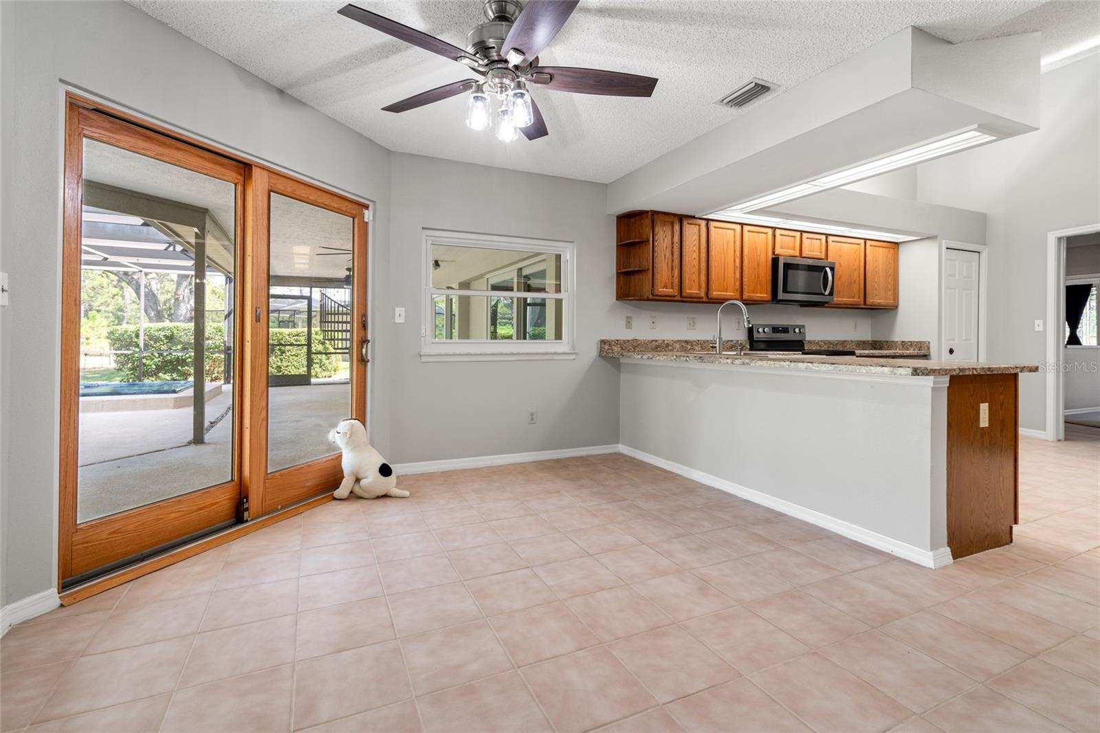 Eating space in the kitchen, impact resistant double doors, new ceiling fan