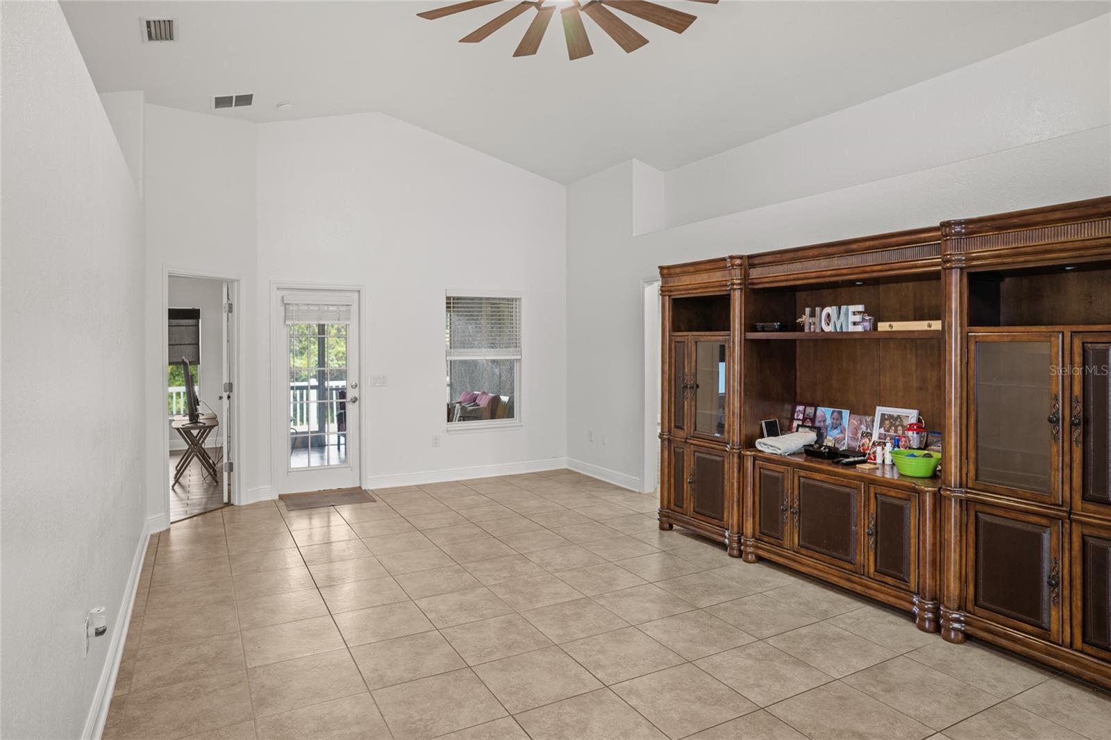 Family room with updated ceiling fan