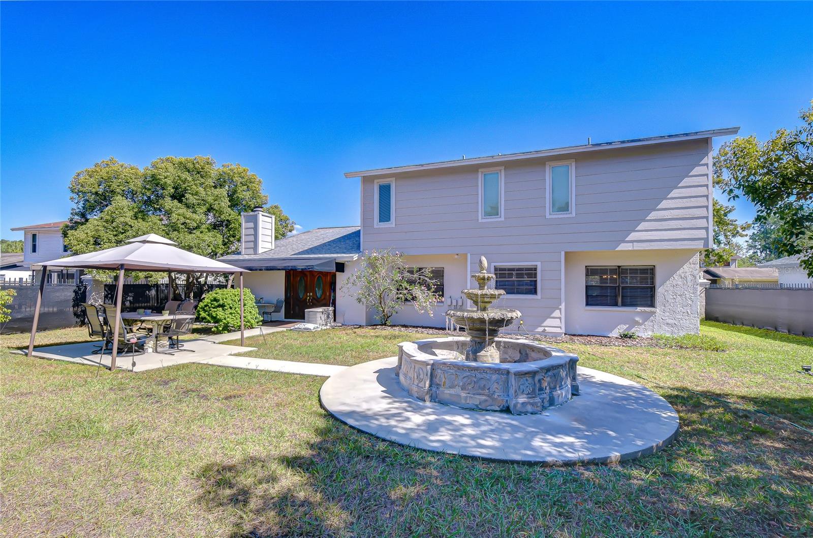 Spacious yard with water feature!