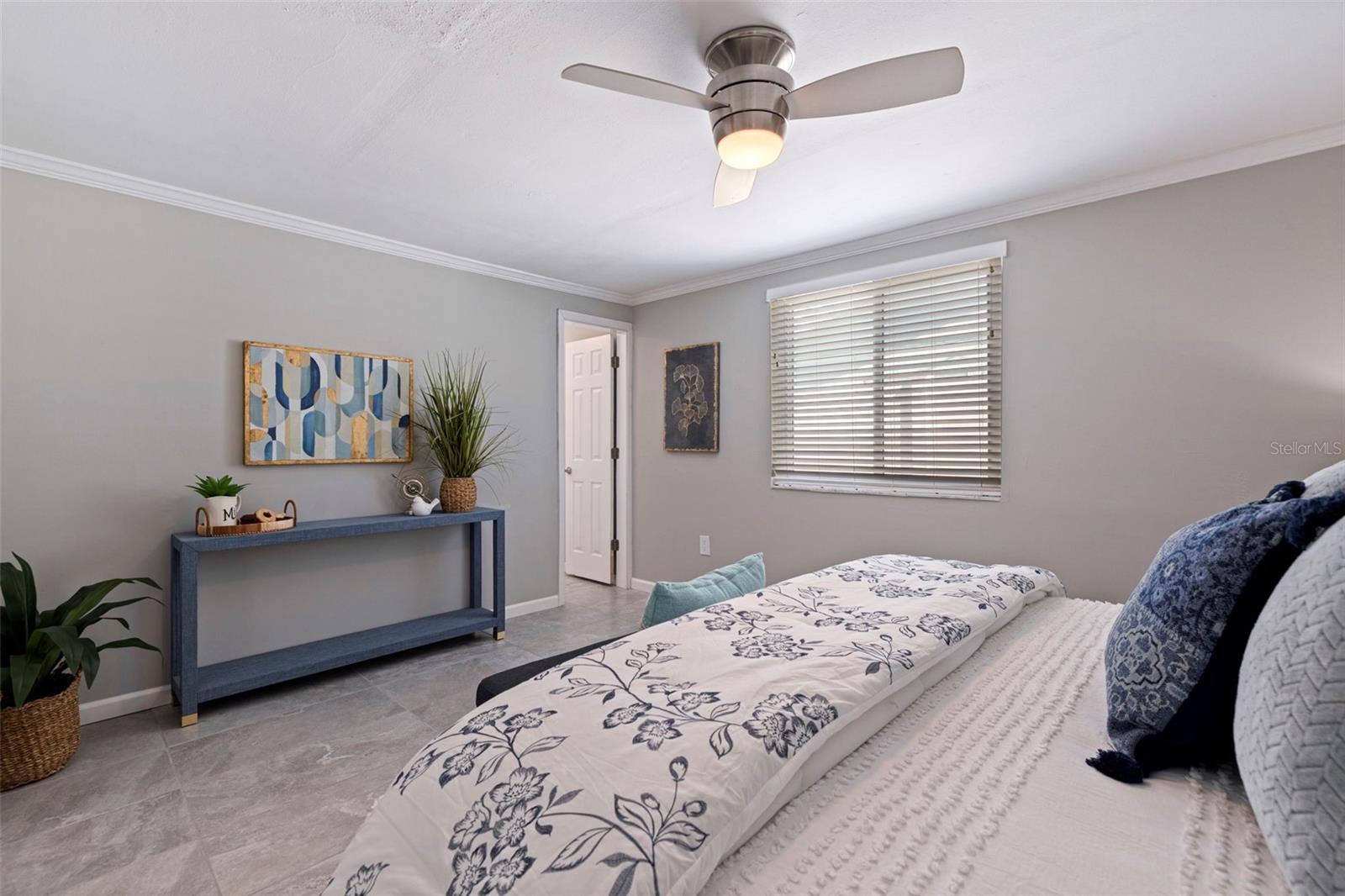 Primary bedroom at front of house off living room