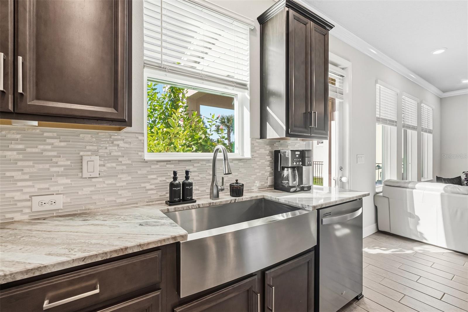 Farmhouse sink overlooking the backyard